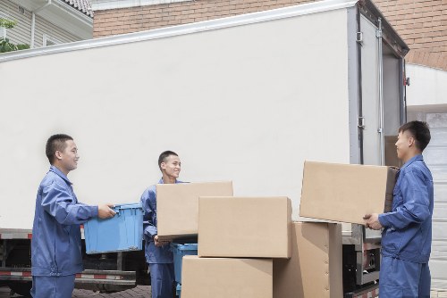 Expert movers handling office equipment in Nottinghill