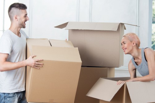 Professional movers handling furniture